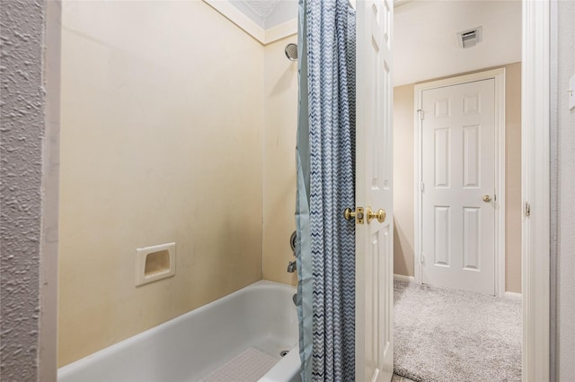 2603 Piney Woods Dr, Pearland, TX 77581 - bathroom with shower / tub combo with curtain and baseboards