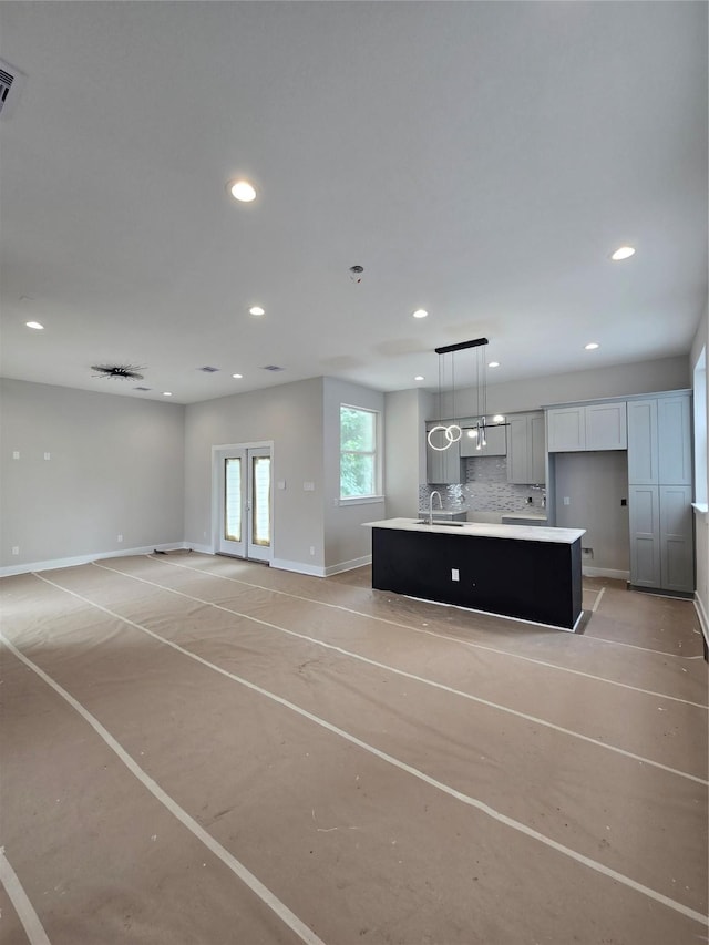 3404 Rawley St, Houston, TX 77020 - unfurnished living room with a sink and recessed lighting