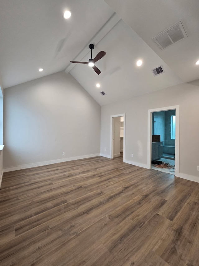 3404 Rawley St, Houston, TX 77020 - unfurnished bedroom with lofted ceiling, dark wood-type flooring, ensuite bath, a walk in closet, and recessed lighting
