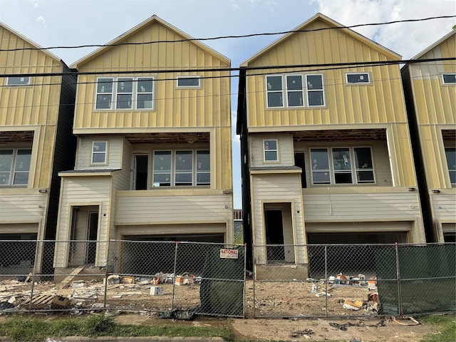 5107 Ave J, Houston, TX 77011 - view of front of house featuring a fenced front yard and board and batten siding