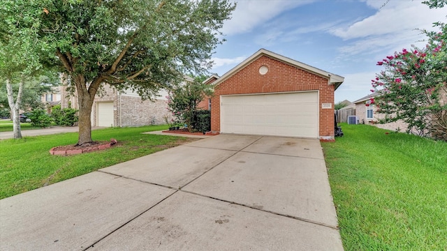 2319 Blue Reef Dr, Katy, TX 77449 - view of front facade featuring brick siding and a front lawn