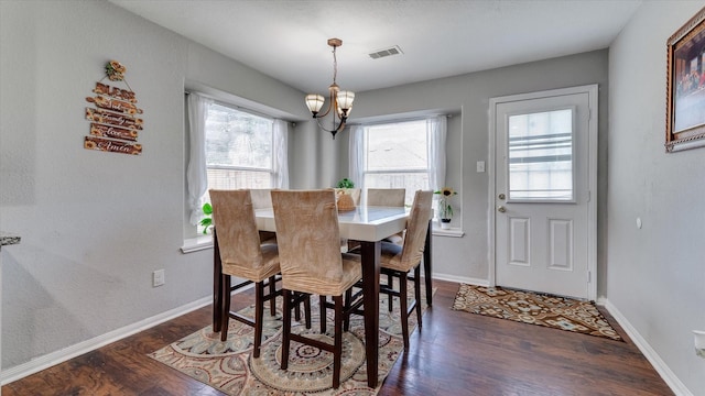 2319 Blue Reef Dr, Katy, TX 77449 - dining space featuring a chandelier and dark wood-type flooring