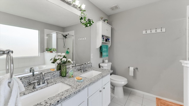 2319 Blue Reef Dr, Katy, TX 77449 - full bathroom with a shower stall, double vanity, a bath, and tile patterned floors