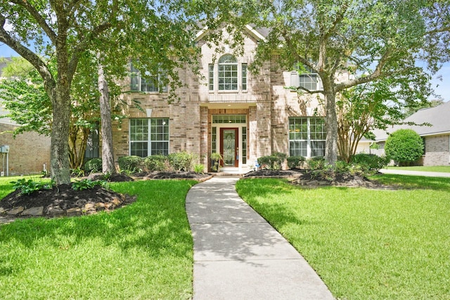 4802 N Pine Brook Way, Houston, TX 77059 - view of front of property featuring brick siding and a front lawn