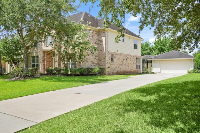 4802 N Pine Brook Way, Houston, TX 77059 - view of front of property featuring brick siding, a front lawn, concrete driveway, and an attached garage