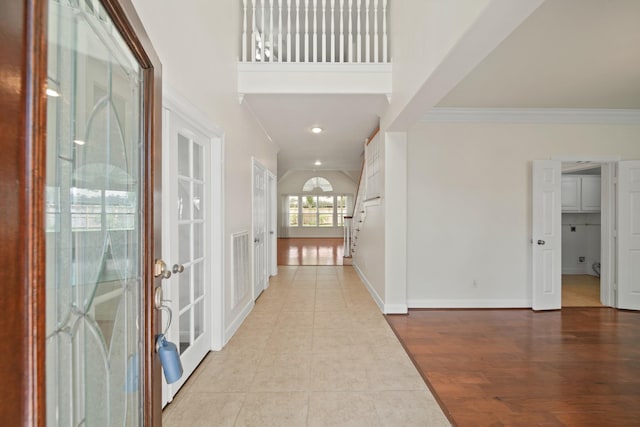 4802 N Pine Brook Way, Houston, TX 77059 - entrance foyer featuring french doors, crown molding, and light tile patterned flooring