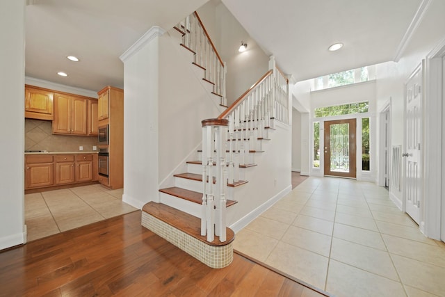 4802 N Pine Brook Way, Houston, TX 77059 - foyer entrance featuring stairway, light tile patterned floors, and recessed lighting
