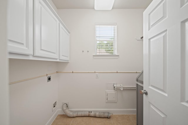 4802 N Pine Brook Way, Houston, TX 77059 - washroom with hookup for an electric dryer, cabinet space, and light tile patterned flooring