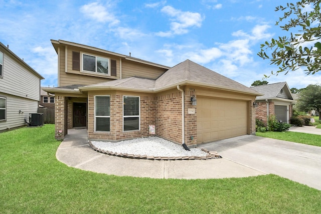 9914 Swallow Dr, Conroe, TX 77385 - view of front of property with a garage, a front yard, concrete driveway, and brick siding