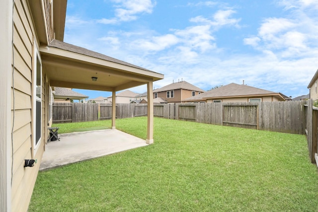 9914 Swallow Dr, Conroe, TX 77385 - fenced backyard with a patio area