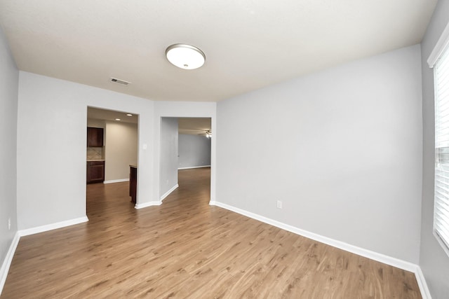 9914 Swallow Dr, Conroe, TX 77385 - unfurnished room with light wood-style floors and a ceiling fan