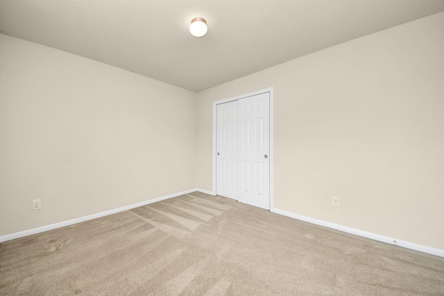 9914 Swallow Dr, Conroe, TX 77385 - spare room featuring carpet flooring and baseboards