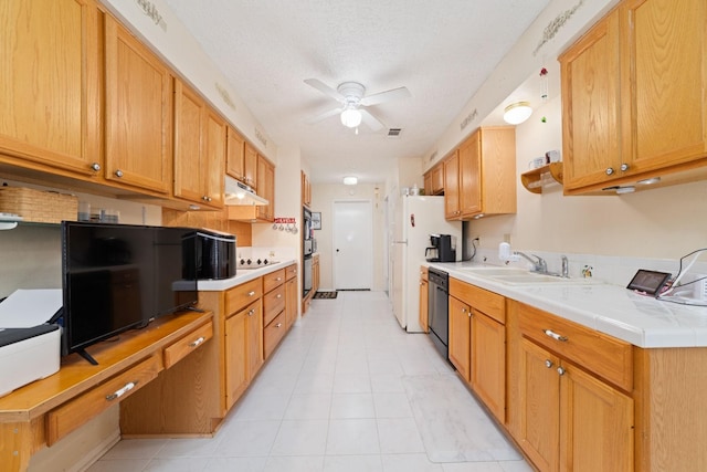 12611 Bexhill Dr, Houston, TX 77065 - kitchen featuring under cabinet range hood, black appliances, a ceiling fan, and light tile patterned floors