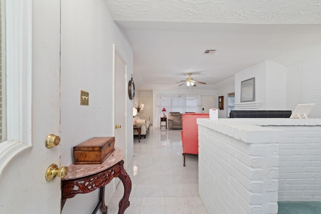 12611 Bexhill Dr, Houston, TX 77065 - corridor featuring light tile patterned floors