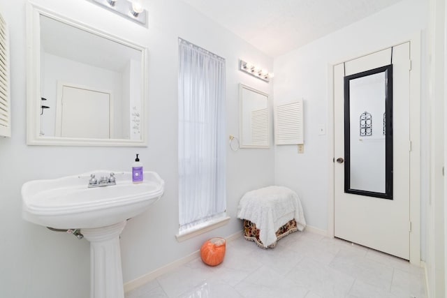 12611 Bexhill Dr, Houston, TX 77065 - bathroom with tile patterned floors and ornate columns