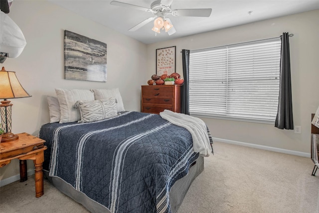 1725 Harvey Mitchell Pkwy S Unit 2234, College Station, TX 77840 - bedroom with light colored carpet and a ceiling fan