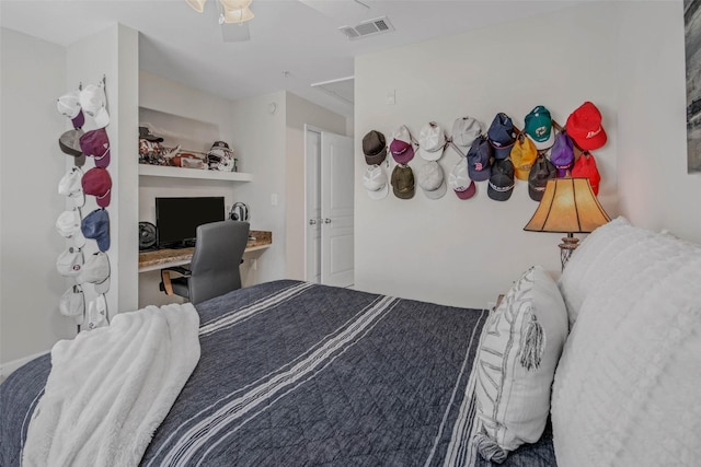 1725 Harvey Mitchell Pkwy S Unit 2234, College Station, TX 77840 - bedroom featuring built in study area, attic access, and a ceiling fan
