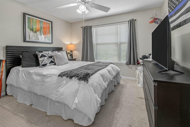1725 Harvey Mitchell Pkwy S Unit 2234, College Station, TX 77840 - carpeted bedroom featuring baseboards and ceiling fan