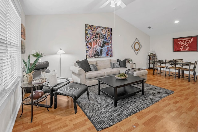 1725 Harvey Mitchell Pkwy S Unit 2234, College Station, TX 77840 - living room featuring vaulted ceiling, a ceiling fan, and wood finished floors