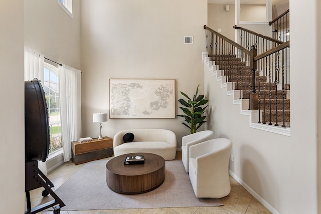 20314 Tarpon Bay Ln, Cypress, TX 77433 - living area featuring a towering ceiling, tile patterned flooring, and stairs