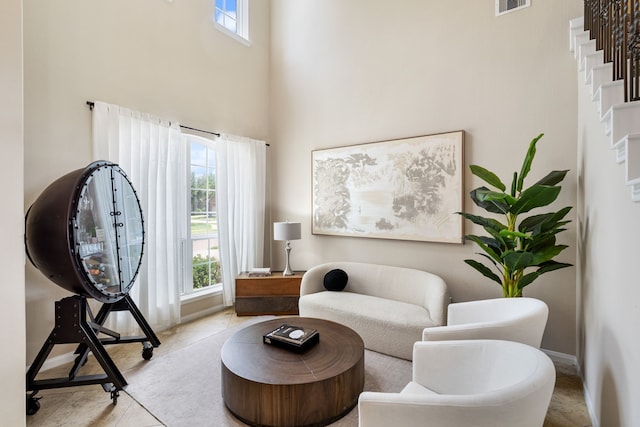 20314 Tarpon Bay Ln, Cypress, TX 77433 - living area featuring a towering ceiling and tile patterned floors