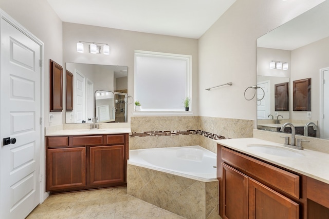 20314 Tarpon Bay Ln, Cypress, TX 77433 - bathroom with a bath, two vanities, walk in shower, and tile patterned flooring