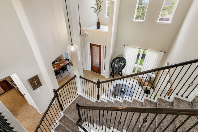 20314 Tarpon Bay Ln, Cypress, TX 77433 - foyer entrance featuring a high ceiling, stairway, and tile patterned flooring