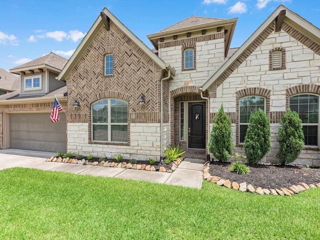 4623 Bisontine Bay Ln, Rosharon, TX 77583 - french country inspired facade featuring stone siding, a shingled roof, concrete driveway, and a front lawn