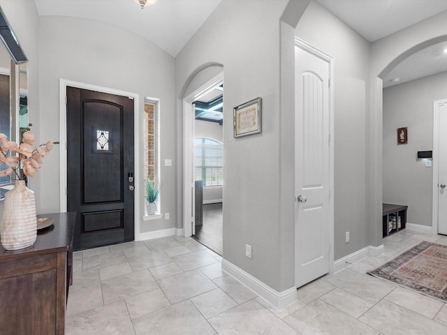 4623 Bisontine Bay Ln, Rosharon, TX 77583 - foyer with baseboards and arched walkways