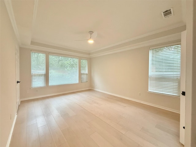 19 Pebble Hollow Ct, The Woodlands, TX 77381 - empty room featuring a ceiling fan, ornamental molding, and light wood finished floors