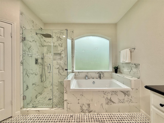 19 Pebble Hollow Ct, The Woodlands, TX 77381 - bathroom featuring a bath, a marble finish shower, and vanity