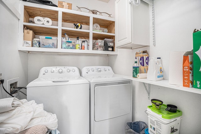 16615 Mansvelt Rd, Jamaica Beach, TX 77554 - washroom with cabinet space and independent washer and dryer