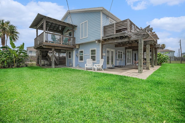16615 Mansvelt Rd, Jamaica Beach, TX 77554 - back of property with a pergola, a patio area, stairway, and french doors