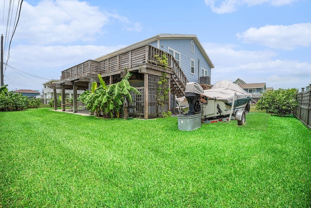 16615 Mansvelt Rd, Jamaica Beach, TX 77554 - back of property featuring stairway and a deck