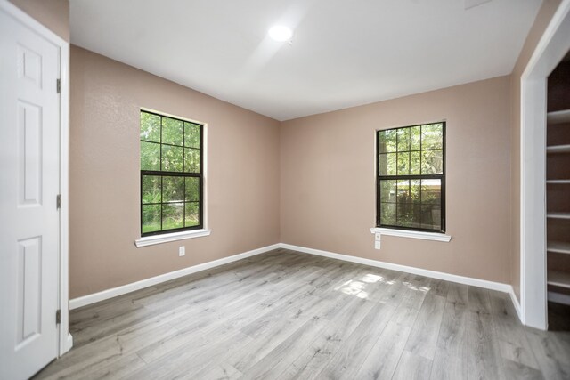 300 Duncan Ave, Lufkin, TX 75901 - unfurnished room featuring light wood-style flooring