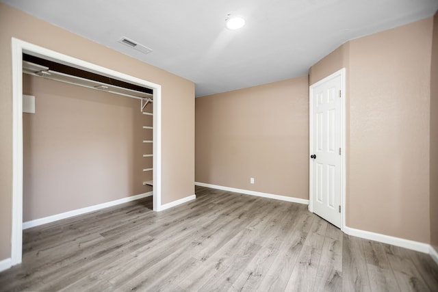 300 Duncan Ave, Lufkin, TX 75901 - unfurnished bedroom featuring wood finished floors and a closet