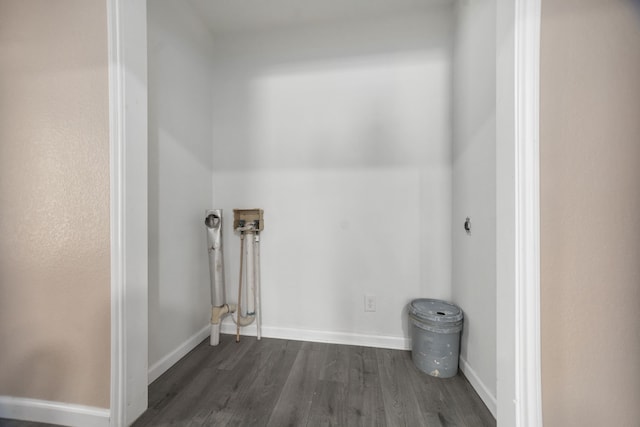 300 Duncan Ave, Lufkin, TX 75901 - laundry room featuring electric dryer hookup, dark wood-type flooring, and washer hookup
