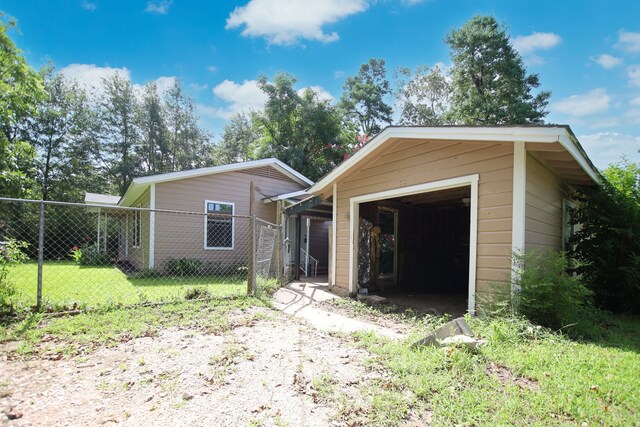 300 Duncan Ave, Lufkin, TX 75901 - view of front of home featuring an outbuilding and a garage