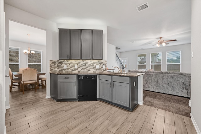11346 Cascading Stream Way, Houston, TX 77044 - kitchen featuring black dishwasher, gray cabinets, light wood finished floors, a peninsula, and a ceiling fan