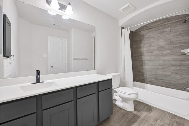 11346 Cascading Stream Way, Houston, TX 77044 - full bath with vanity, shower / bathtub combination with curtain, and wood finished floors