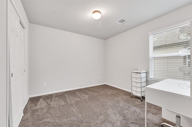 11346 Cascading Stream Way, Houston, TX 77044 - unfurnished bedroom with carpet flooring, an office area, and a closet
