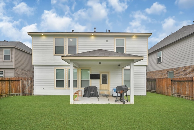 11346 Cascading Stream Way, Houston, TX 77044 - rear view of property with a patio, a fenced backyard, and a shingled roof