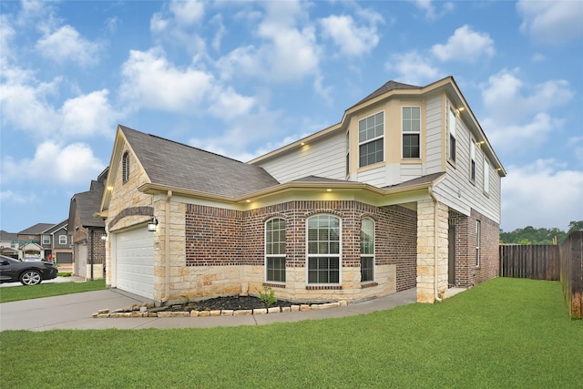 11346 Cascading Stream Way, Houston, TX 77044 - view of front of house featuring stone siding, concrete driveway, a shingled roof, brick siding, and a garage