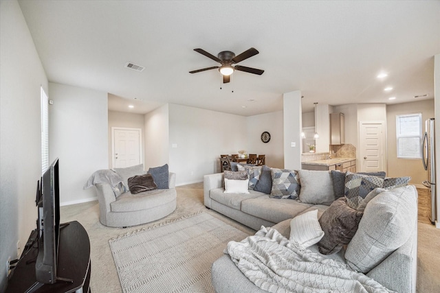 2322 Honey Heights Ln, Fresno, TX 77545 - living area with light carpet, a ceiling fan, and recessed lighting