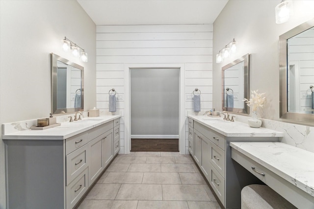 5240 Larkin St, Houston, TX 77007 - bathroom with two vanities and tile patterned flooring