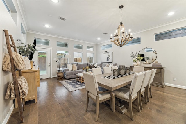 5240 Larkin St, Houston, TX 77007 - dining space featuring a chandelier, crown molding, dark wood-type flooring, and recessed lighting