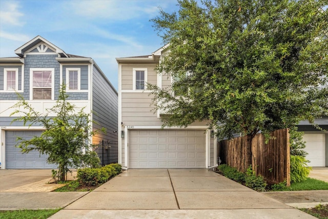 5240 Larkin St, Houston, TX 77007 - view of front of property with an attached garage and concrete driveway