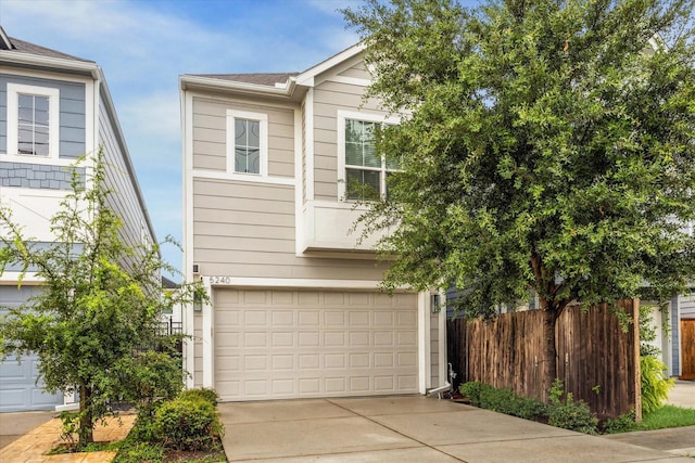 5240 Larkin St, Houston, TX 77007 - view of front of home featuring an attached garage and driveway