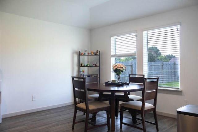 1126 Hyde Lake Ln, Missouri City, TX 77459 - dining area featuring wood finished floors and vaulted ceiling
