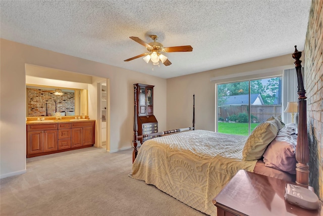 16426 Cavendish Dr, Houston, TX 77059 - bedroom with access to outside, light carpet, a textured ceiling, ensuite bathroom, and a ceiling fan